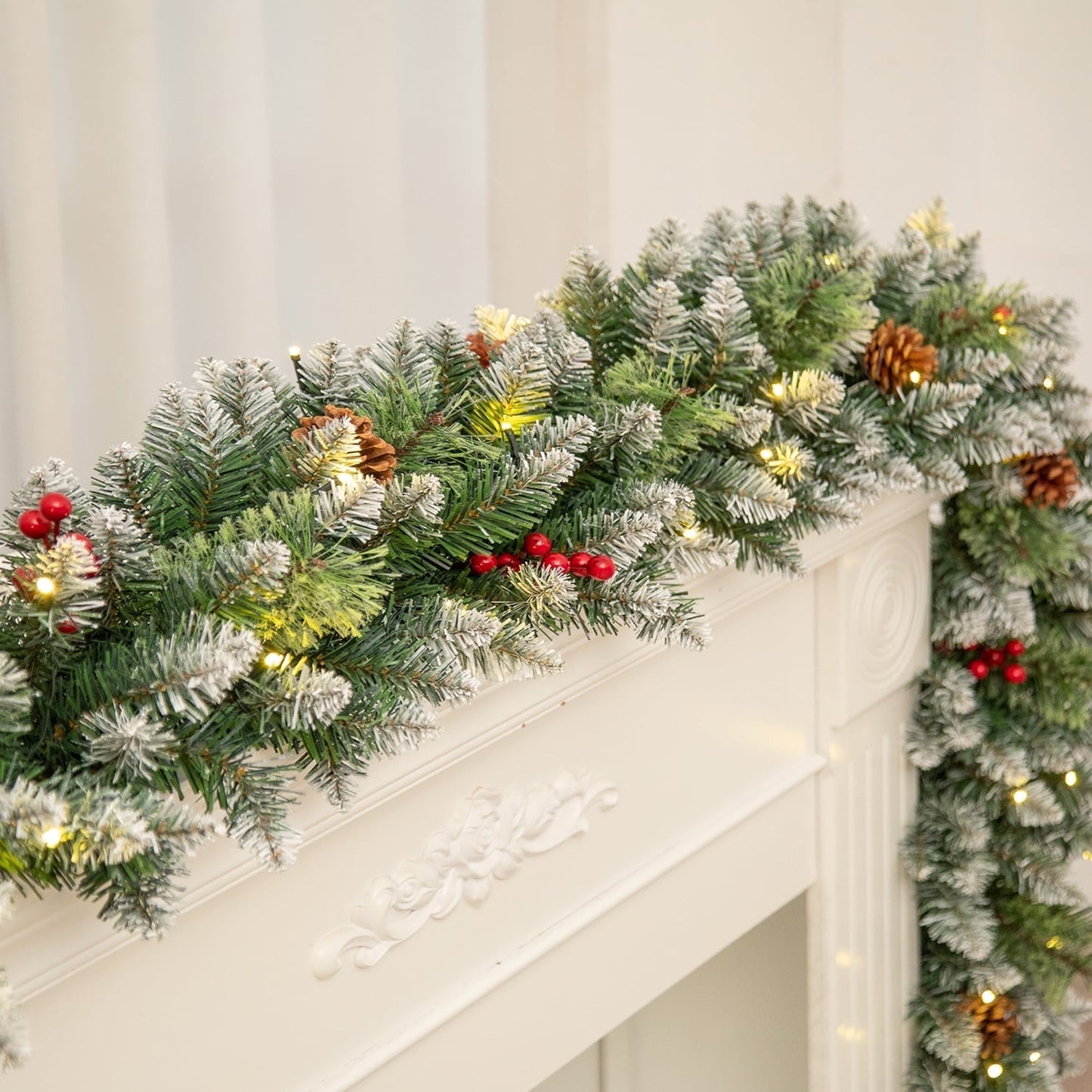posrue 9ft Outdoor Pre-Lit Christmas Garland with Lights for Indoor Outdoor Christmas Decoration, 8 Lighting Modes, 275 Branches, Battery Operated, Green